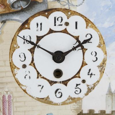 Antique gilt bronze and porcelain mantel clock with chivalric scenes