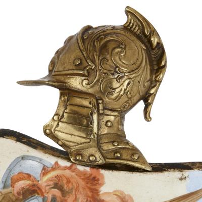 Antique gilt bronze and porcelain mantel clock with chivalric scenes