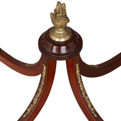 Antique ormolu and mounted mahogany stand with onyx top