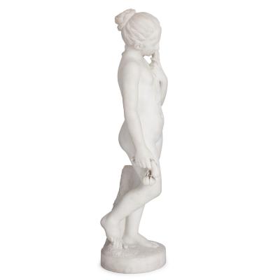 Antique sculpted marble figure of a young girl