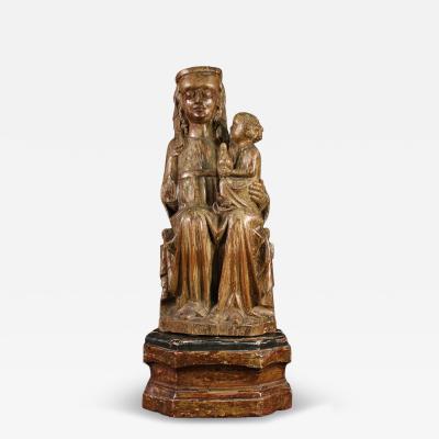 Antique wooden sculpture from the 15th century Madonna with Child