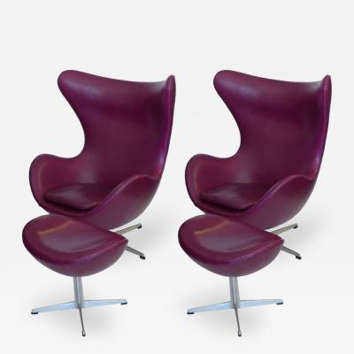 Arne Jacobsen Pair of Original Mulberry Leather Egg Chairs with Ottomans by Arne Jacobsen