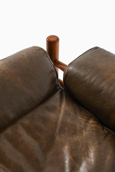 Arne Norell Inca Easy Chair and Stool in Beech Brass Leather by Arne Norell 1960s
