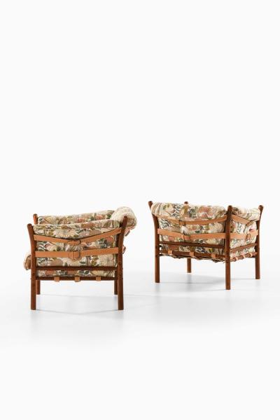 Arne Norell Pair of Indra Easy Chairs in Beech Brass Leather by Arne Norell 1970s