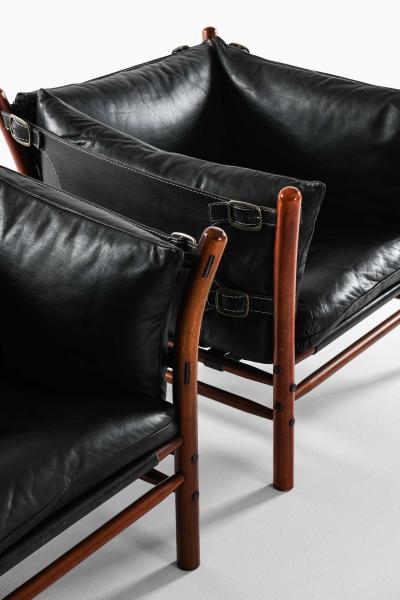 Arne Norell Pair of Mid Century Easy Chairs in Beech Brass Leather by Arne Norell 1960s