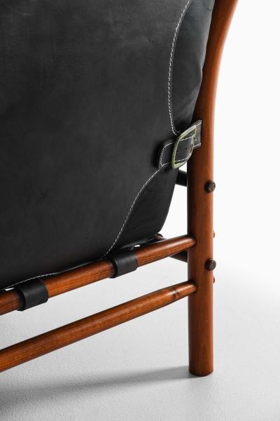 Arne Norell Pair of Mid Century Easy Chairs in Beech Brass Leather by Arne Norell 1960s