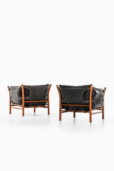 Arne Norell Pair of Mid Century Easy Chairs in Beech Brass Leather by Arne Norell 1960s