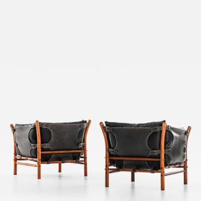 Arne Norell Pair of Mid Century Easy Chairs in Beech Brass Leather by Arne Norell 1960s