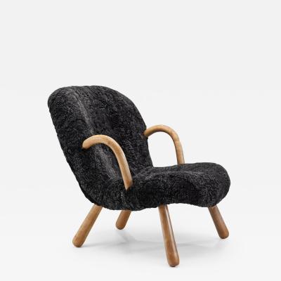 Arnold Madsen Clam Chair in Sheepskin by Arnold Madsen for Madsen Schubell Denmark 1944