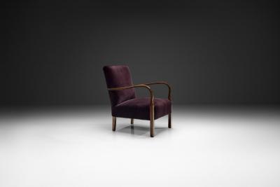 Art Deco Armchair with Aubergine Upholstery Europe First half of the 20th C