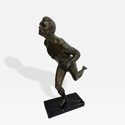 Art Deco bronze figure of a man wearing a loin cloth running