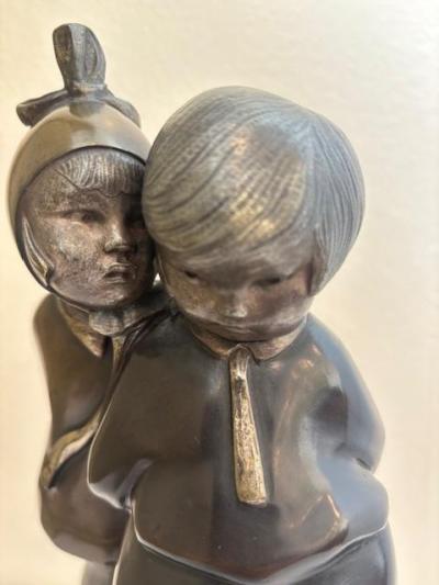 Art Deco bronze figure of boy and girl