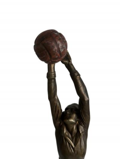 Art Deco bronze goalie soccer player standing on a round green onyx base