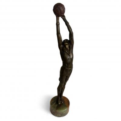 Art Deco bronze goalie soccer player standing on a round green onyx base