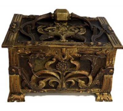 Art Nouveau brass and copper box with head and green velvet interior