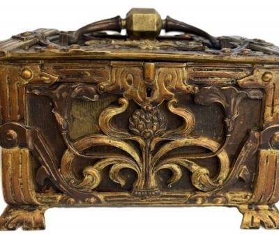 Art Nouveau brass and copper box with head and green velvet interior