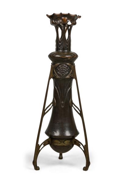 Art Nouveau bronze floor vase supported by 3 open design legs