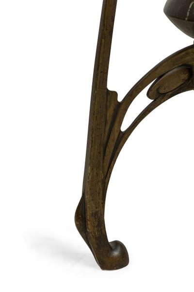 Art Nouveau bronze floor vase supported by 3 open design legs
