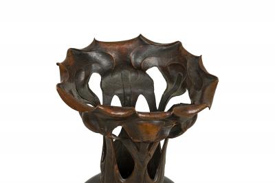 Art Nouveau bronze floor vase supported by 3 open design legs