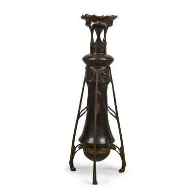 Art Nouveau bronze floor vase supported by 3 open design legs