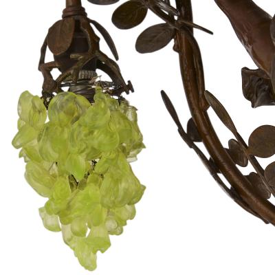 Art Nouveau period bronze and coloured glass chandelier