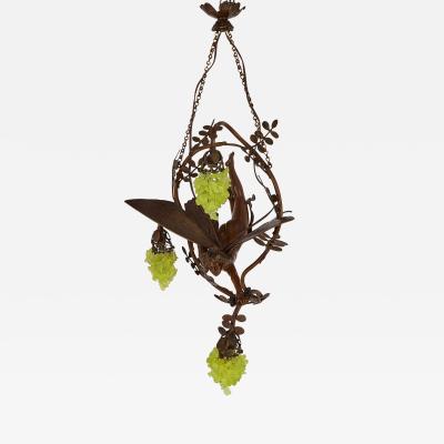 Art Nouveau period bronze and coloured glass chandelier