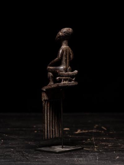 Ashanti Comb representing Female sitting Figure Ghana
