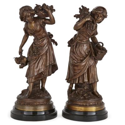 Auguste Moreau Two antique spelter female figures by Moreau