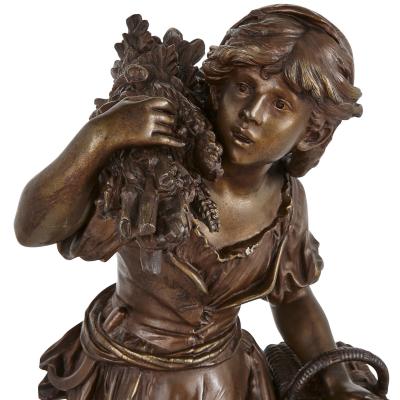 Auguste Moreau Two antique spelter female figures by Moreau