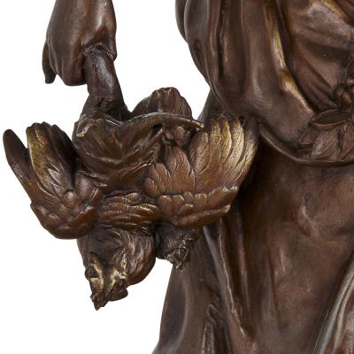 Auguste Moreau Two antique spelter female figures by Moreau