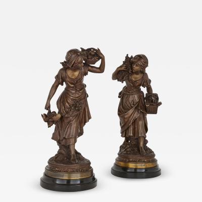 Auguste Moreau Two antique spelter female figures by Moreau