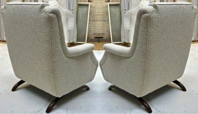 Awesome comfy pair of lounge chairs with rare horn shaped legs