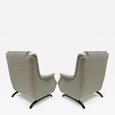 Awesome comfy pair of lounge chairs with rare horn shaped legs