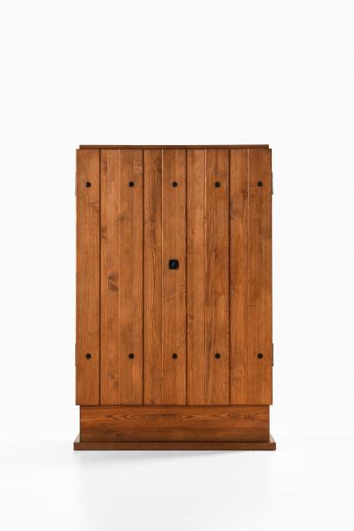 Axel Einar Hjorth Lov Cabinet in Iron Pine and Wrought Iron by Axel Einar Hjorth 1930s