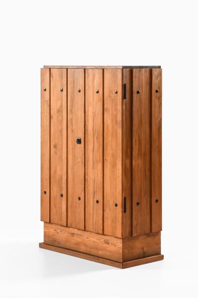 Axel Einar Hjorth Lov Cabinet in Iron Pine and Wrought Iron by Axel Einar Hjorth 1930s
