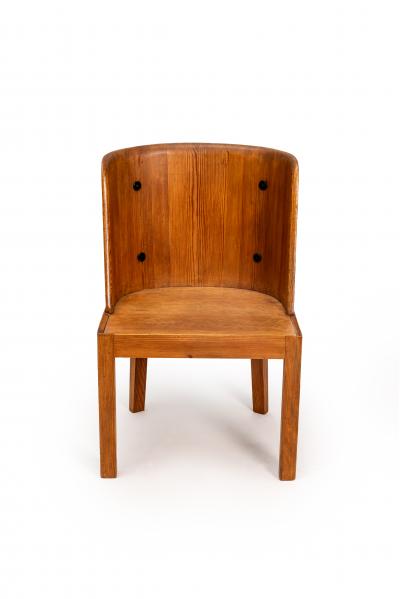 Axel Einar Hjorth Lovo armchair stained pine and iron rivets