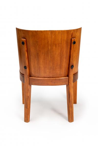 Axel Einar Hjorth Lovo armchair stained pine and iron rivets