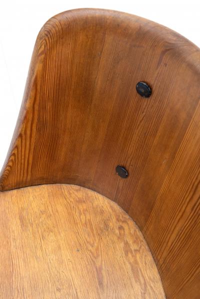 Axel Einar Hjorth Lovo armchair stained pine and iron rivets