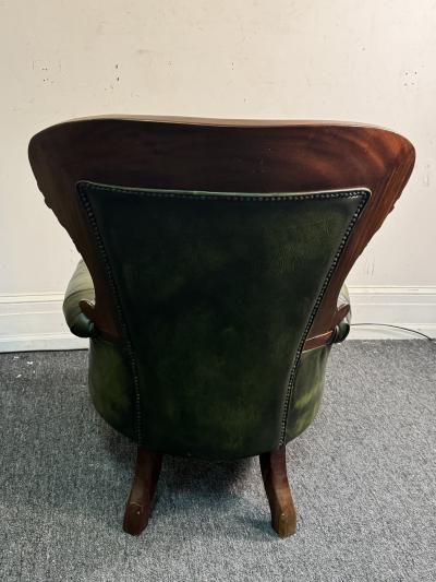 BEAUTIFUL ORNATELY CARVED WOOD AND BUTTON TUFTED LEATHER ARMCHAIR