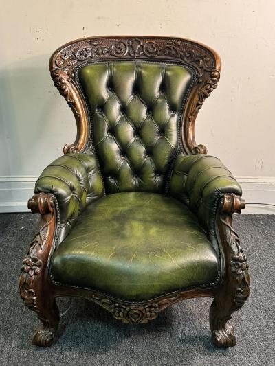 BEAUTIFUL ORNATELY CARVED WOOD AND BUTTON TUFTED LEATHER ARMCHAIR