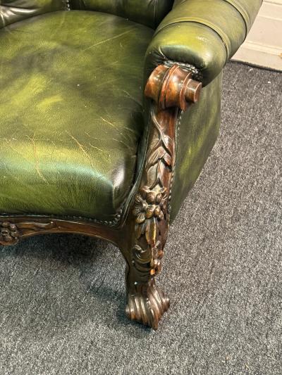 BEAUTIFUL ORNATELY CARVED WOOD AND BUTTON TUFTED LEATHER ARMCHAIR