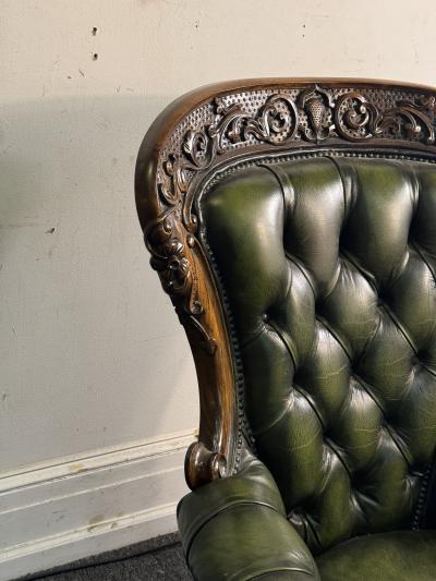 BEAUTIFUL ORNATELY CARVED WOOD AND BUTTON TUFTED LEATHER ARMCHAIR