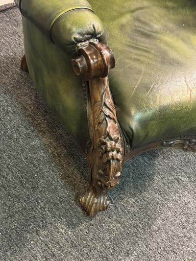 BEAUTIFUL ORNATELY CARVED WOOD AND BUTTON TUFTED LEATHER ARMCHAIR