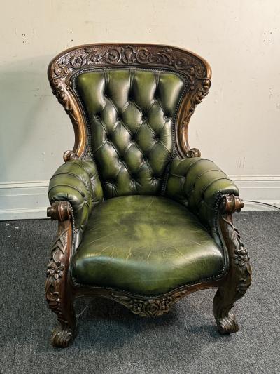 BEAUTIFUL ORNATELY CARVED WOOD AND BUTTON TUFTED LEATHER ARMCHAIR