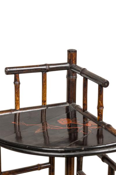Bamboo and black lacquered decorated corner cabinet with door