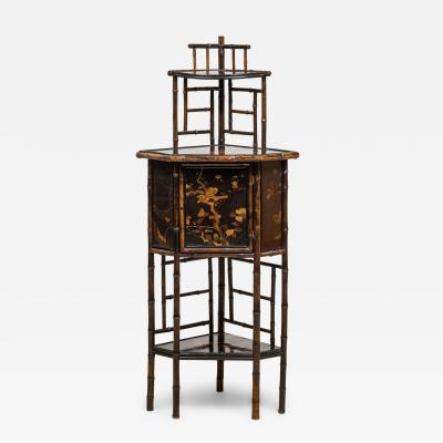 Bamboo and black lacquered decorated corner cabinet with door