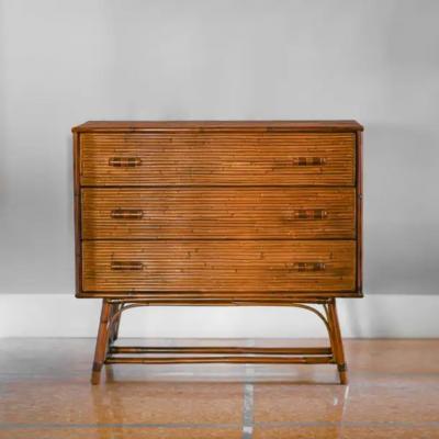 Bamboo chest of drawers with leather bindings Italian production 