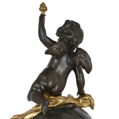 Baroque style bronze and ormolu cherub mantel clock