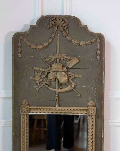 Beautiful Louis XVI period trumeau in grey green painted wood