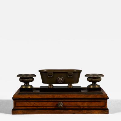 Benjamin Lewis Vulliamy A Regency inkstand in the form of an ancient Roman labrum flanked by urns